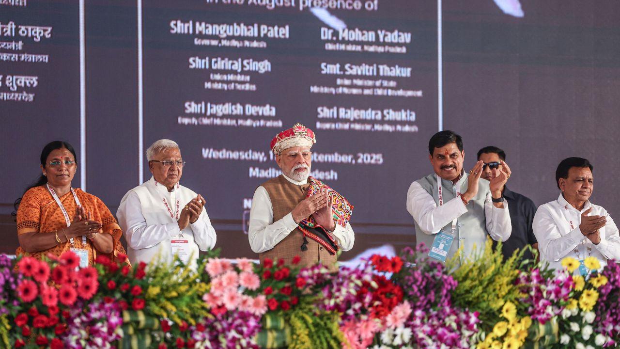 Prime Minister Narendra Modi wit Chief Minister Mohan Yadav during the foundation stone laying ceremony of the PM MITRA Park and inauguration of various campaigns, in Dhar. Madhya Pradesh 